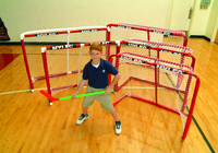 Image for Mylec Pro Style Steel Hockey Goal with Nylon Net, 54 x 44 x 30 Inches, Red and White from School Specialty