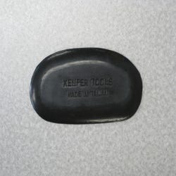 Image for Kemper Hard Finishing Rubber, 4-1/2 Inches, Black from School Specialty