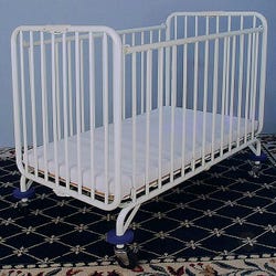 Image for L.A. Baby Holiday Compact Crib with 2-Inch Mattress, 39-1/2 x 24-1/4 x 37-1/2 Inches, Metal, White from School Specialty