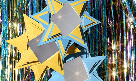 Stars made out of construction paper.