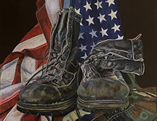 military boots with an american flag and medals