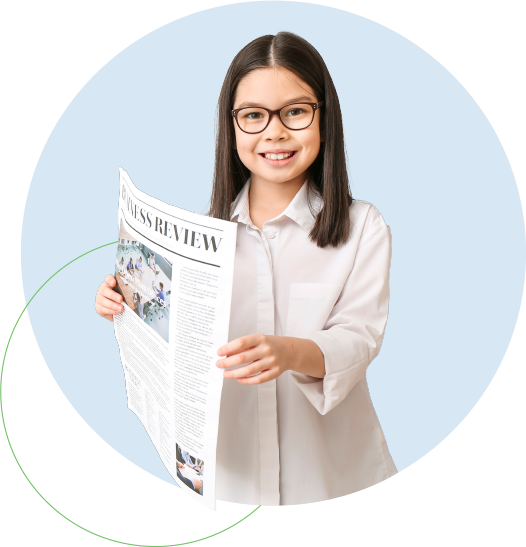 Smiling young person with glasses and white shirt holding out a newspaper.