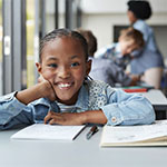 happy student at her desk